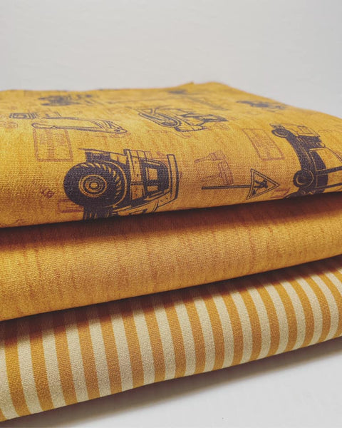 Fabric Tone on Tone Construction Vehicles on Faux Heather